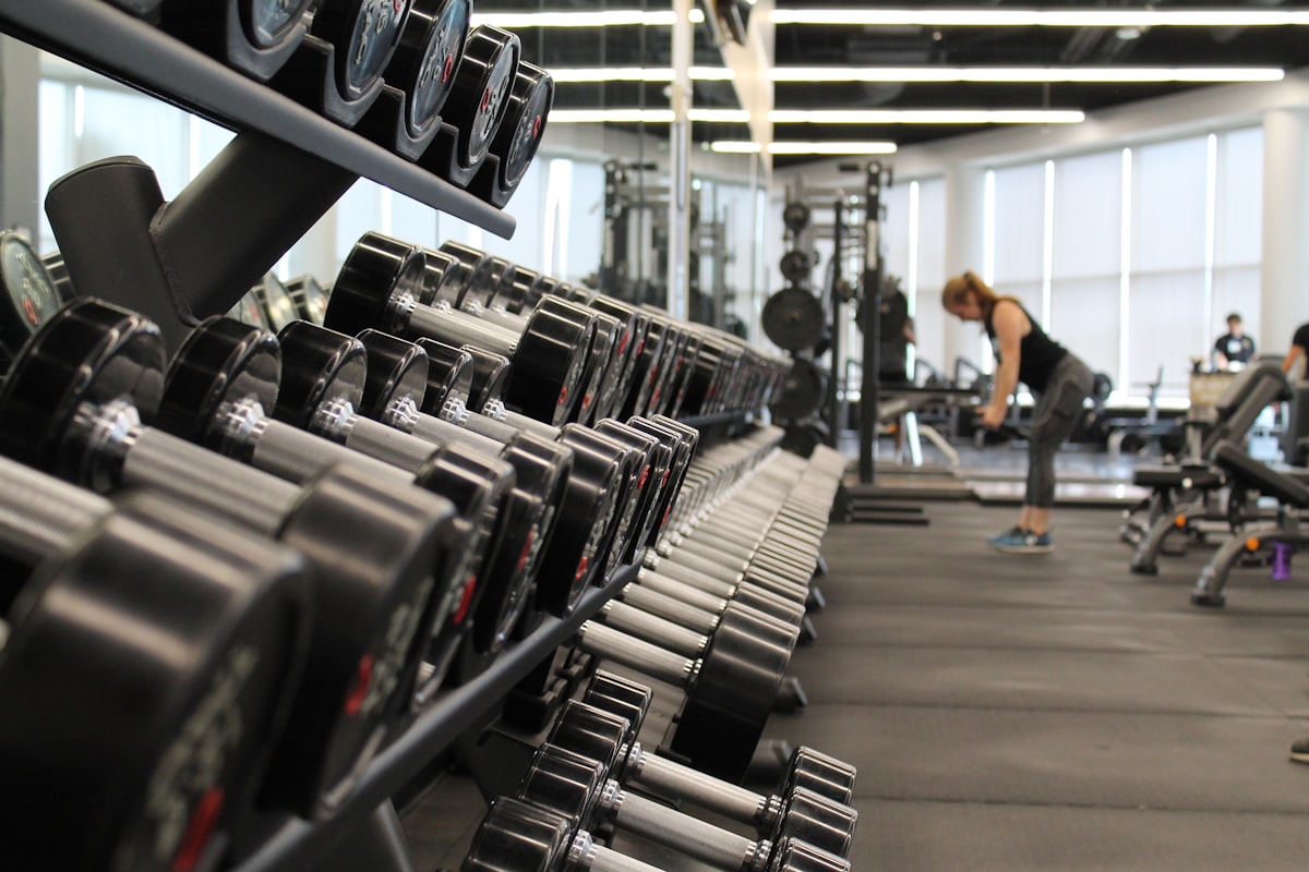 A person doing deadlifts in a gym